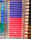 neatly arranged colored pens