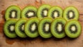 Neatly arranged kiwi slices display a vibrant consistent pattern of Royalty Free Stock Photo