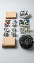 Neatly arranged recyclable materials on a gray surface include stacks of cardboard Royalty Free Stock Photo