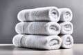 A neatly arranged stack of folded towels placed against an isolated white background Royalty Free Stock Photo