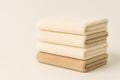 A neatly arranged stack of folded towels placed against an isolated white background Royalty Free Stock Photo