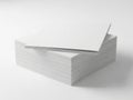 Stack of pristine white paper sheets on clean surface isolated on white background Royalty Free Stock Photo