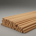 A neatly arranged stack of wooden dowels, each with a square cross-section, placed on Royalty Free Stock Photo