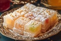 Neatly arranged Turkish delight Rahat Lokum on ornate plate