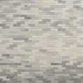 A neatly arranged wall of rectangular bricks in various shades of gray and beige. Eac Royalty Free Stock Photo