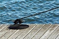 Neatly Coiled Rope on Boat Dock