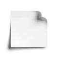 A neatly folded corner of a blank white paper sheet resting on a plain surface Royalty Free Stock Photo