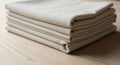 A neatly folded stack of beige Royalty Free Stock Photo