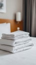 A stunning image of freshly washed white cotton bed sheets neatly folded. Clean surface in room. Bedding set Royalty Free Stock Photo