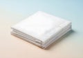 Neatly Folded White Fabric Stack on Pastel Background Royalty Free Stock Photo