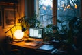 A neatly organized desk featuring a computer and a lamp to provide illumination, The tranquility and chaos of working from home, Royalty Free Stock Photo