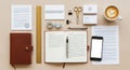 Neatly organized desk with a variety of stationery items. Items include a brown leather Royalty Free Stock Photo