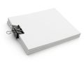 Stack of white paper secured with black clip Royalty Free Stock Photo