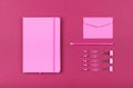 Neatly organized stationery flat lay of pink