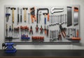 A neatly organized tool wall in a workshop. Tools including hammers, screwdrivers, pliers, wrenches, Royalty Free Stock Photo