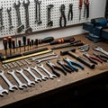 A neatly organized workshop bench with various tools displayed. In front, an array of Royalty Free Stock Photo