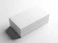 A neatly stacked pile of blank white paper on a light-colored surface Royalty Free Stock Photo
