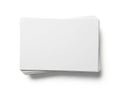 A neatly stacked pile of blank white paper sheets on a white surface Royalty Free Stock Photo