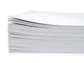 A neatly stacked pile of white printer paper on a plain white background Royalty Free Stock Photo