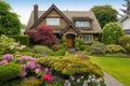 neatly trimmed front lawn and blooming garden in cozy house exterior
