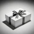 A neatly wrapped, rectangular gift box with a smooth, white surface is adorned with a Royalty Free Stock Photo