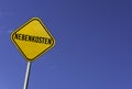 Nebenkosten - yellow sign with blue sky background