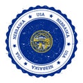 Nebraska flag badge.
