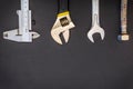 Necessary set of tools for plumbers on black background with space for advertising Royalty Free Stock Photo