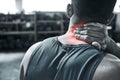 Neck pain can stop any bodybuilder. Back of an athlete with neck pain. A neck injury is serious. Bodybuilding risks CGI Royalty Free Stock Photo