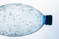 The neck of a plastic bottle with water drops inside, macro shot. Royalty Free Stock Photo