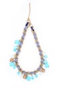 Necklace with blue stones isolated on white Royalty Free Stock Photo