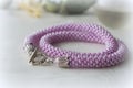 Necklace from a large lilac beads