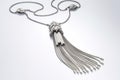 A Necklace With Long Chains With Tassels Or Fringe White Background. Generative AI