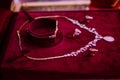 A necklace and a pair of gold earrings offered to the Moroccan bride on her wedding night. Royalty Free Stock Photo