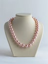 Necklace with pink pearls.