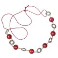 Necklace of red coral balls on red leather cord Royalty Free Stock Photo