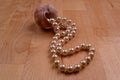 a necklace with shimmering golden natural pearls