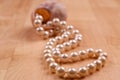 a necklace with shimmering golden natural pearls