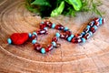 Short colorfull necklace with red and turquoise colors
