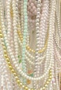 Necklaces made with thousands of colorful pearls