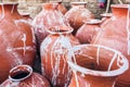 Necks of painted clay jugs of different sizes Royalty Free Stock Photo