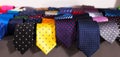 Row of Neckties on hangers in men clothing store Royalty Free Stock Photo