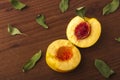 Nectarine is broken in half. Royalty Free Stock Photo