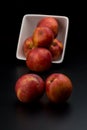 Nectarine friut on dark isolated background Royalty Free Stock Photo