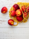 Nectarine. Ripe juicy organic nectarines peaches in a reusable mesh cotton shopping bag Royalty Free Stock Photo