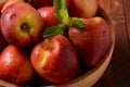 Nectarine. Ripe juicy organic nectarines  in a wooden bowl. Royalty Free Stock Photo