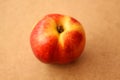 Nectarine on wooden background