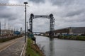 Neder-Over- Heembeek, Brussels, - Belgium - The broken Buda bridge over the canal with industry and a biking path