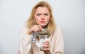 Need another antibiotic. Cute sick girl taking anti cold pills. Unhealthy woman holding pills and water glass. Ill woman Royalty Free Stock Photo