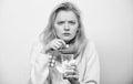 Need another antibiotic. Cute sick girl taking anti cold pills. Unhealthy woman holding pills and water glass. Ill woman Royalty Free Stock Photo